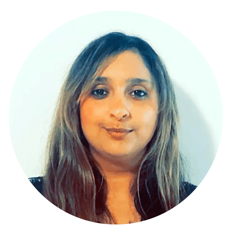 Professional headshot of Happie Kaur, a friendly and approachable real estate agent with a bright smile. She has a warm and outgoing personality, reflecting her dedication to helping clients feel at home in their property journey.