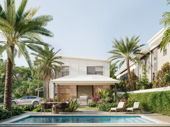 Landscaped pool garden with outdoor seating and BBQ pavilion within contemporary townhome community in Morayfield Queensland